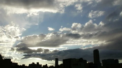 Sunshine cloudscape over the silhouette of buildings in Tokyo. Stock Footage 61799299