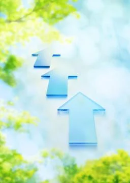 Sunshine filtering through foliage and arrows pointing up Illustrazione stock