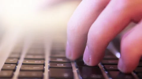 Sunshine Hand on a keyboard Stock Footage 40527128