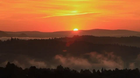Sunshine with moving clouds in the mountains 스톡 동영상 105221685