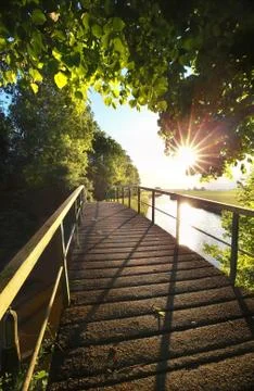 Sunshine over bridge Stock Photos