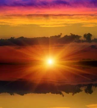 Sunshine over water surface Stock Photos