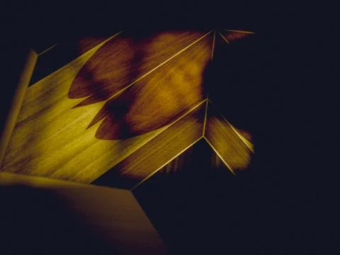 Sunshine overlaying through window on designed clean tile floor of kitchen Stock Photos