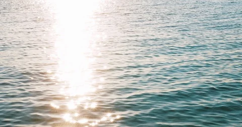 Sunshine sea waves with sun lights star and sky reflection in summer day. Blue Stock Footage 112827161