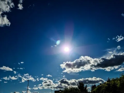 Sunshine Sunlight in the Blue Sky with Clouds Nature Landscapes Stock Photos