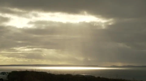 Sunshine through dark cloud Stock Footage 33057069