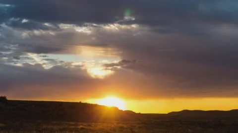 Sunshine through dramatic clouds Stock Footage 59840852