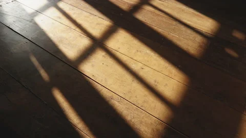 Sunshine through windows with shadows on wooden floor old Stock Footage 147606892