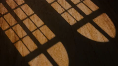 Sunshine through windows with shadows on wooden floor Stock Footage 155215565