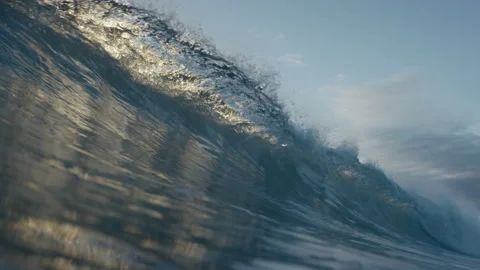 Sunshining as the waves roll in Video stock 169309259