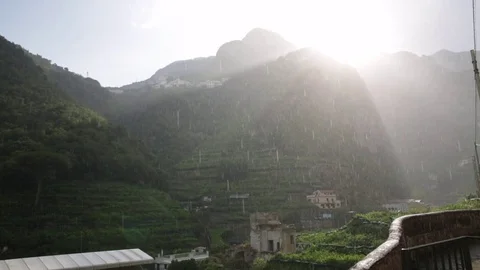 Sunshower in the mountains in Italy - static, Europe - pan Stock Footage