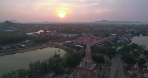 Sunsrise Over Buddhist Temple Pullback Aerial Reveal Shot Stock Footage 63108525