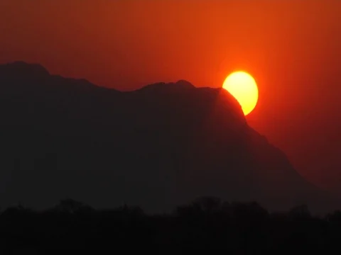 Sunst behind mountains 库存影片 126090786