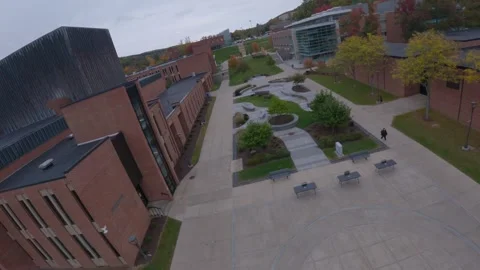 SUNY Oneonta Courtyard - FPV Drone (FLAT Color) Stock Footage 240430923