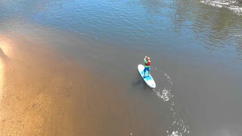 Sup and paddle Stock Footage 105821613