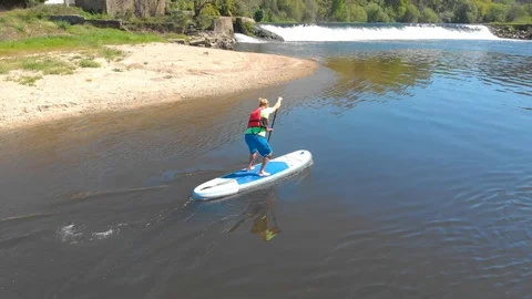 Sup and paddle Stock Footage 105872147