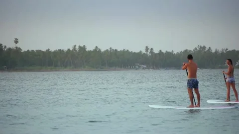 A sup boarding Stock Footage 93838394