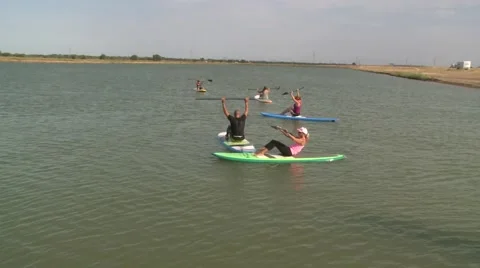 SUP STAND UP PADDLE BOARDING WORKOUT SIT-UPS YOGA HD 1080 Stock Footage 46266374