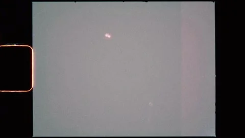 Super-8 8mm Authentic Dust and Scratch Overlay Reel Texture Retro Filter with Stock-Footage 311542138