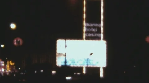 Super 8 - Las Vegas 1978: Marina Hotel Neon Signs Stock Footage 105868521
