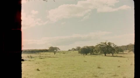 Super 8 | Looking out over the countryside Stock Footage 140426259