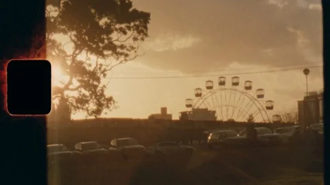 Super 8 - Sunset Ferris Wheel - Mid Shot Video stock 120335660