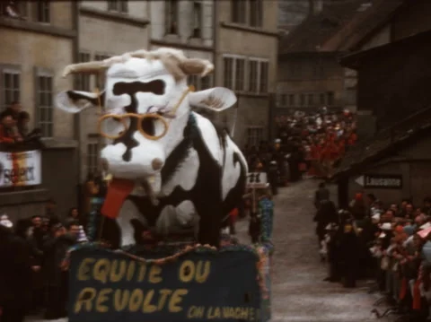 SUPER 8 - SWITZERLAND - carnival float price of milk - Fribourg - 1971 Stock Footage 225239896
