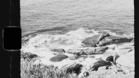 Super 8 - Waves Crashing Rocks - Black and White Video stock 113946220