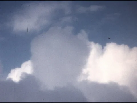 SUPER 8 - window view of plane flying in clouds - 1970 Stock Footage 283811711