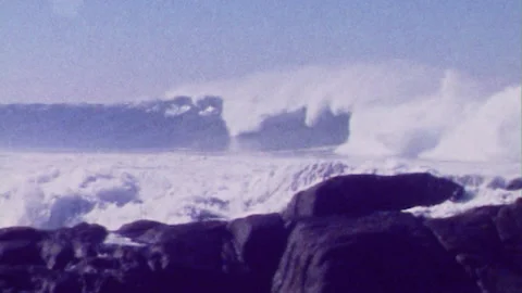 Super 8mm after storm wave breaking 스톡 동영상 135318291