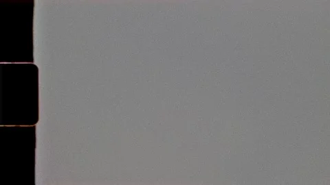 Super 8mm Retro Filter Overlay with Authentic Reel Texture, Light Flicker, Dust 動画素材 311885692