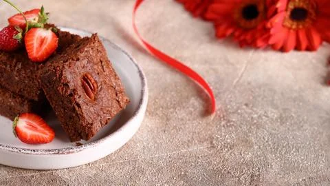 Super chocolate brownie with nuts Stock Photos