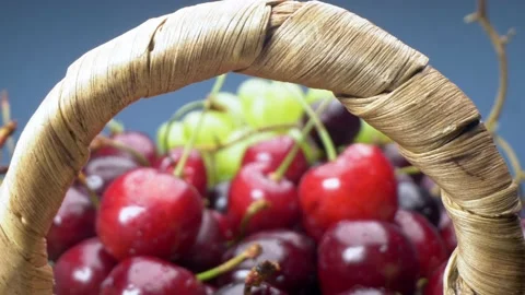 Super close up. Details of cherries, green and red grapes in a basket Stock Footage 133622686