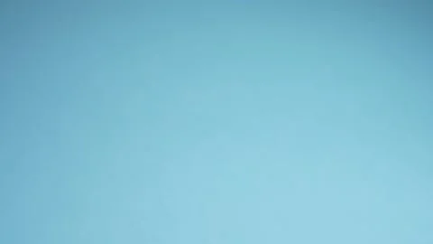 Super close details. view between a lot of fresh carrots on a blue background Stock Footage 135294355