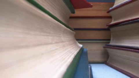 Super close up details. view between stacks of many books Stock Illustration