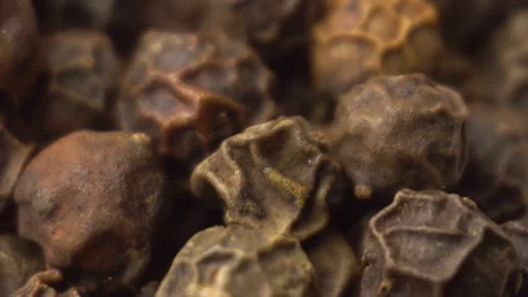 Super close-up of dried peppercorns, smooth motion. Stock Footage 147678072