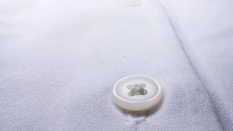 Super close elements of a button down blouse. textile background Stock Photos