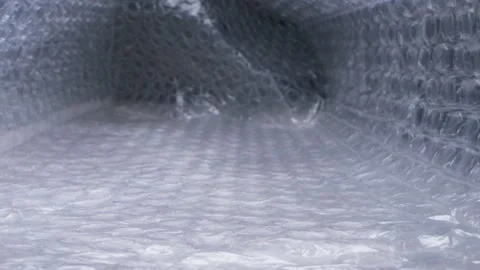 Super close up. elements of packaging cellophane material with bubbles Stock Footage 133550974