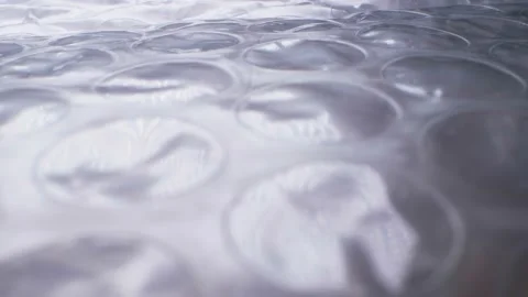 Super close up. elements of packaging cellophane material with bubbles Stock Footage 134666964