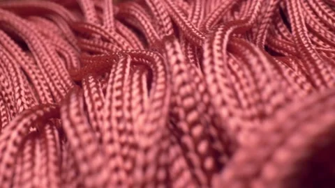 Super close up. elements of red fringe. textile background Video stock 133730346