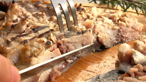 Super close-up of a fork taking a piece of grilled white Mackerel fish Video stock 169813377