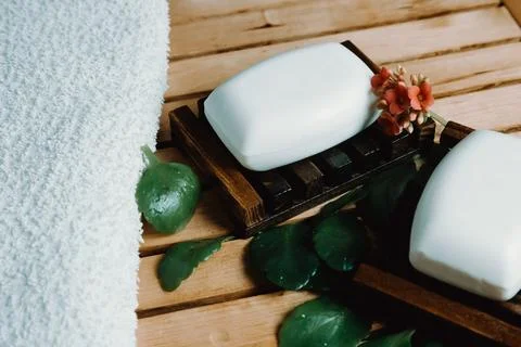 A super close up of a hard soap over a soap dish with relaxing spa style wi.. Stock Photos
