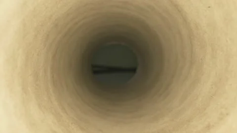 Super close up. macro shot inside a hollow cardboard tube Vídeo Stock 138036934