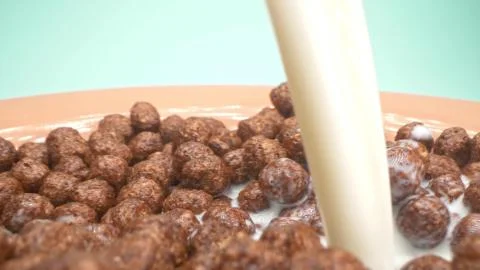 Super close up. milk is poured into breakfast cereals chocolate corn balls Stock Illustration