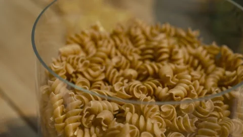 Super close-up of pasta curls of hard varieties. Healthy nutrition. Video stock 246794431