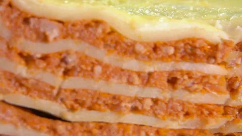 Super close-up a piece of the delicious lasagna Stock Footage 74196319