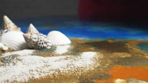 Super close up. the process of making panels of epoxy resin, shells and moss Stock Footage 133448805