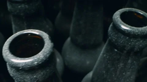 Super close up, rows of empty dusty glass bottles Stock Footage 140715382