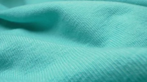 Super closeup. elements of a gentle blue blouse with frills. textile background Foto stock