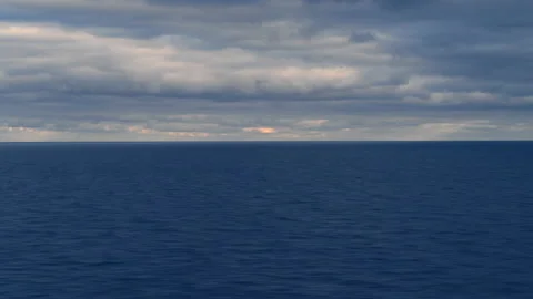 Super deep blue timelapse of sea water and cloudy sky Stock Footage 149708277